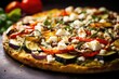 A unique twist on traditional pizza, this image showcases a delicious glutenfree cauliflower crust pizza overloaded with an assortment of ovenroasted vegetables such as zucchini, eggplant,