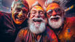 three senior adult friends enjoying holi festival with bright colors on their faces