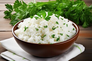 Poster - Top view of delicious rice and parsley in a bowl on white wooden table