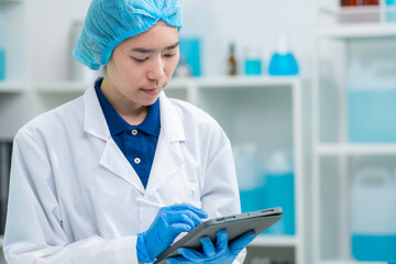 Wall Mural - scientist or medical technician working, having a medical discuss, senior female scientist superviso