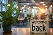 © Dusit - A business office with the text welcome back in a big classy font in the foreground. Generative AI.
