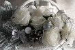 Closeup view of a bouquet of white artificial roses	