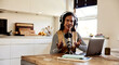© Flamingo Images - Woman talking during a home podcast