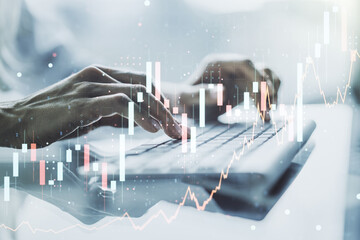 Poster - Multi exposure of abstract financial graph with hand typing on laptop on background, financial and trading concept