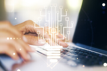 Poster - Creative light bulb with chip hologram and hands typing on computer keyboard on background, artificial Intelligence and neural networks concept. Multiexposure