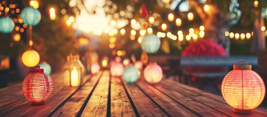 Poster - Beautiful colorful lanterns on wooden table at summer party. with copy space image. Place for adding text or design