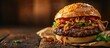 Delicious bacon burger with onion rings and beer. with copy space image. Place for adding text or design