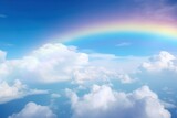 Fototapeta Tęcza - Rainbow between clouds in the sky