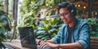 © Attasit - Young adult happy smiling student or businessman wearing headphones talking on online chat meeting using a laptop in office or campus, male student wear glasses learning remotely