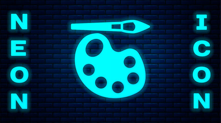 Poster - Glowing neon Paint brush with palette icon isolated on brick wall background.  Vector