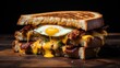 A grilled cheese sandwich with an egg and bacon