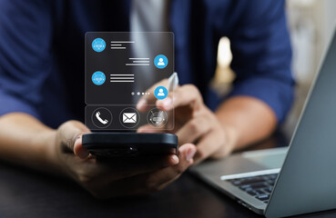 Fototapete - Businessman using AI chatbot conversation assistant in app on device for virtual assistance and customer support digital communication, Contact us Online service with AI Chatbot for efficient support.