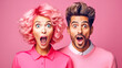 man and a woman with vibrant pink hair, both wearing pink tops and showing expressions of shock and amazement, against a matching pink background, creating a striking monochromatic image