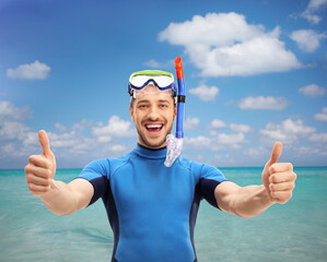 Sticker - Guy in a wetsuit with a diving mask making a thumbs up gesture