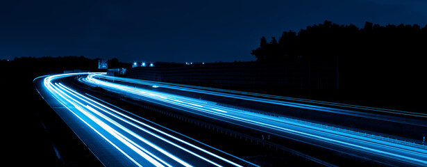 Wall Mural - blue car lights at night. long exposure