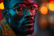 African American man portrait in sunglasses, isolated on neon background