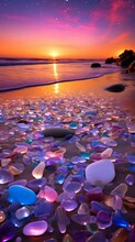 Seaside Sunset With A Sky Painted In Shades Of Purple And Pink, When The Sun Goes Below The Horizon. Foreground Of Smooth, Multicolored Sea Glass Pebbles Glistening On The Shore