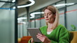 © stockbusters - Thoughtful manager working tablet office closeup. Focused woman using computer