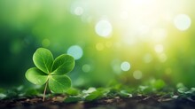 A Leave Of Lucky Clover Against Bokeh Background With Copy Space