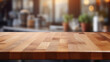 Empty wooden table top with a blurred cafe background, perfect for product display and mockups.