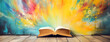 A book is open on a wooden table with a colorful background. Concept of creativity and imagination