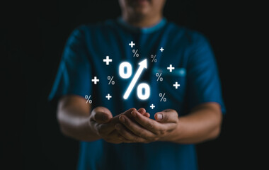 Aufkleber - Businessman holding glowing percentage sign with up arrow symbol for financial planning, mortgage investment dividend from business growth or banking increase interest rate concept.
