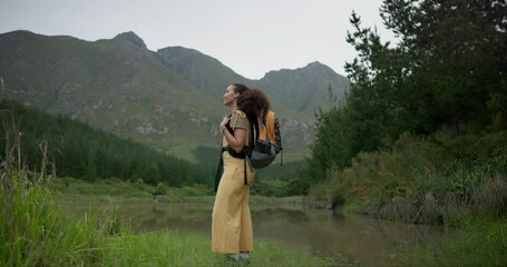 Wall Mural - woman, backpack and mountain for hiking in forest, nature or outdoor scenery of trees, lake or green