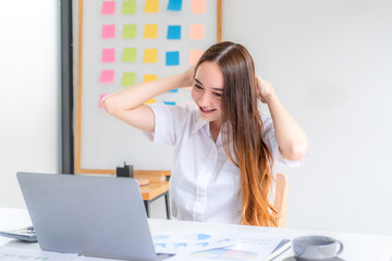 Businesswomen bookkeeper hand use laptop analysis the graph for Setting challenging business goals and ready to achieve target at home office