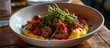 © 2rogan - Bowl of sausage ragout with polenta.