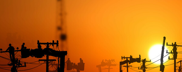 group of silhouette electric worker working on pole connected high voltage transmission line with  high volttag transmission towers