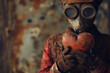 soldier with gas mask holding a valentine's day heart made of wood in his hands. steampunk and apocalyptic background for ads and cards