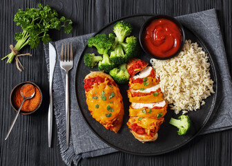 Poster - baked chicken breasts with rice, broccoli on plate