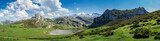 Fototapeta  - Scenic view of Covadonga Lakes in Asturias, Spain against a cloudy blue sky