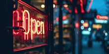 A Vibrant Neon "Open" Sign At A Night Business Establishment, Adding A Bright Urban Touch.