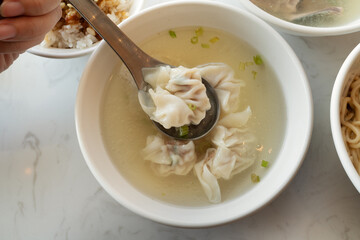 Wall Mural - Wonton dumpling soup, distinctive and famous cuisine of Taiwanese food.