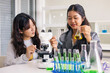 © lovelyday12 - Group of school children using microscopes to study science at school