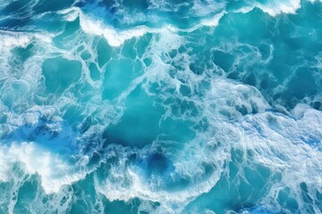   an aerial view of a large body of water with a lot of waves coming in and out of the water.
