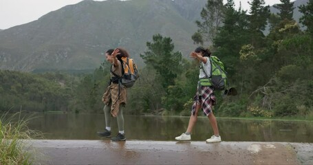 Wall Mural - friends, women and hiking with balance while walking, bridge and lake with travel together. adventur