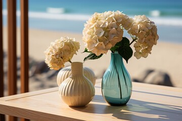  a couple of vases sitting on top of a table next to each other on top of a wooden table.