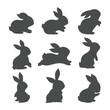 Silhouette of the Easter Bunny in various poses. Easter egg festival greeting card decorative elements