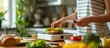 © vxnaghiyev - Healthy diet plan for weight loss daily ready meal menu Woman using meal tracker app on phone while weighing lunch box cooked in advance on kitchen scale Balanced portion with dish Pre cooking