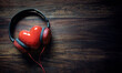 Headphones and red heart concept for love listening to music background