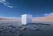 white ice cube in desert