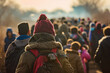 A crowd of refugees crosses the border. Background with selective focus and copy space
