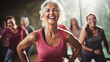 Elderly woman enjoys a cheerful dance class, candidly expressing their active lifestyle through Zumba with friends