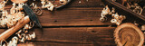 Fototapeta Tulipany - Wood background, carpenter tools, shavings, hammer