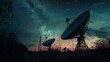 © Emiliia - Observatory's satellite dishes reach for the cosmos against night sky