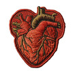 An embroidered patch in the shape of a human heart on a transparent background, ideal for Valentine's Day designs.
