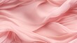  a close up of a pink fabric with a very large amount of ruffled fabric on top of the fabric.