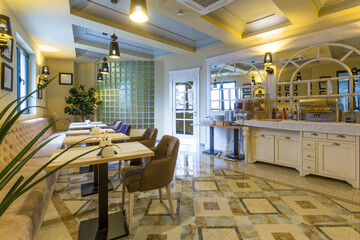 Interior of a  hotel restaurant with buffet table